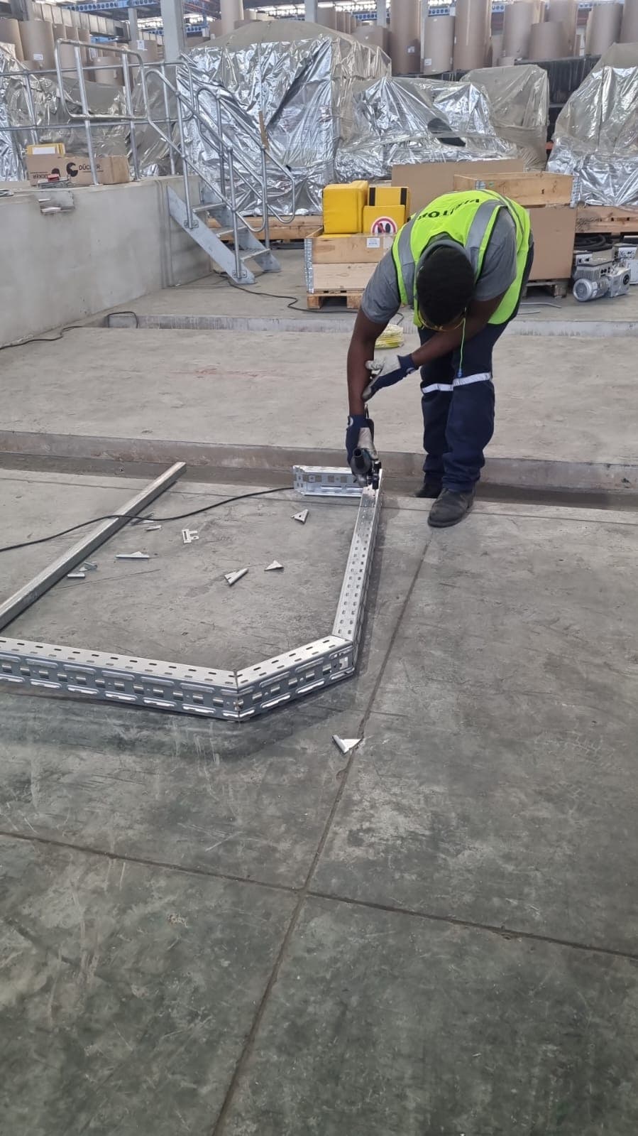 Cable tray installation — factory floor