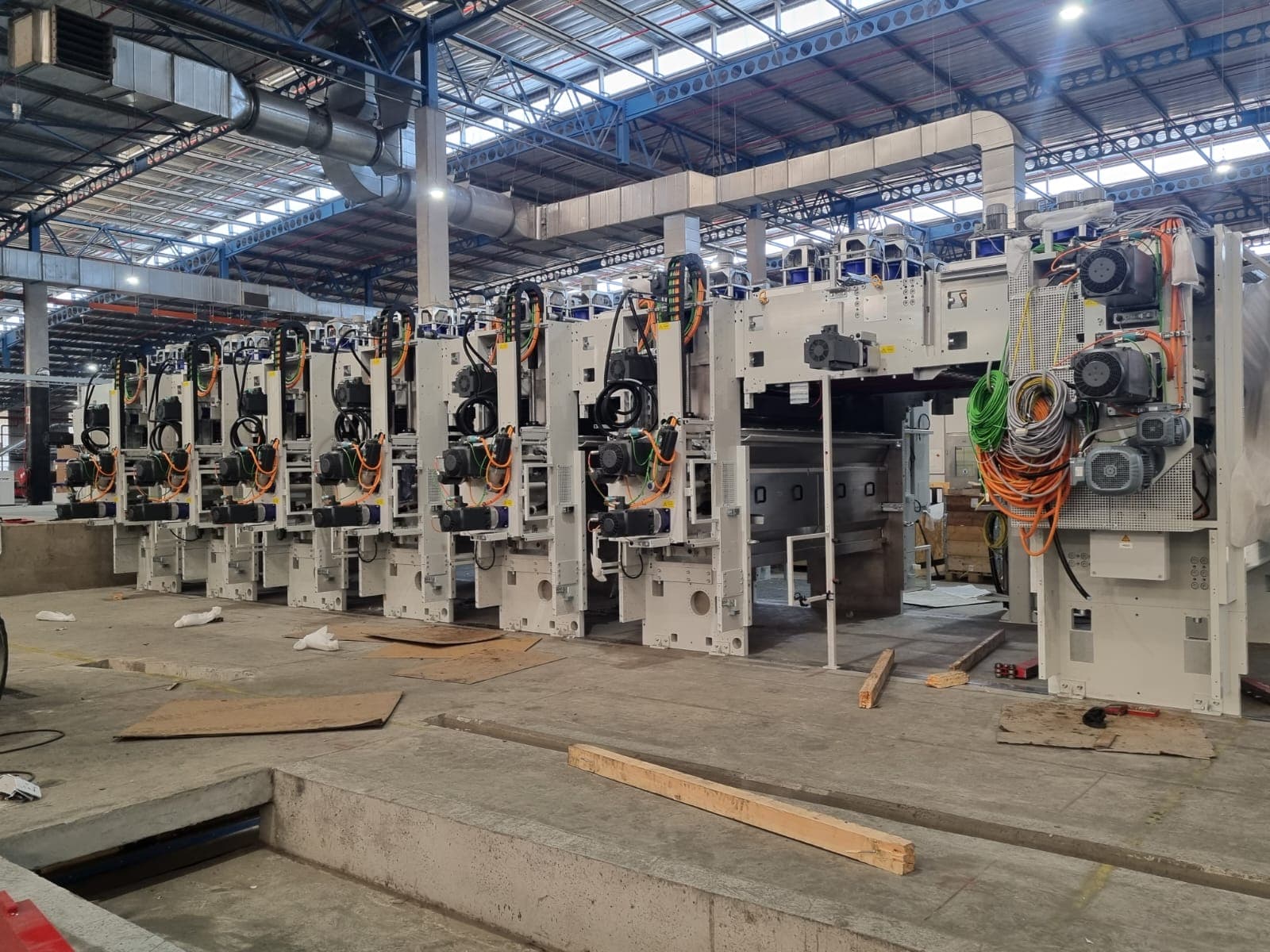 Multi-station machinery commissioning